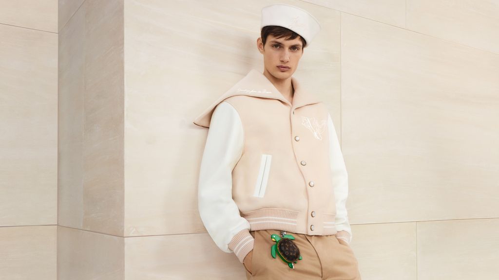 A turtle-shaped charm dangles on a belt loop in this look from Louis Vuitton