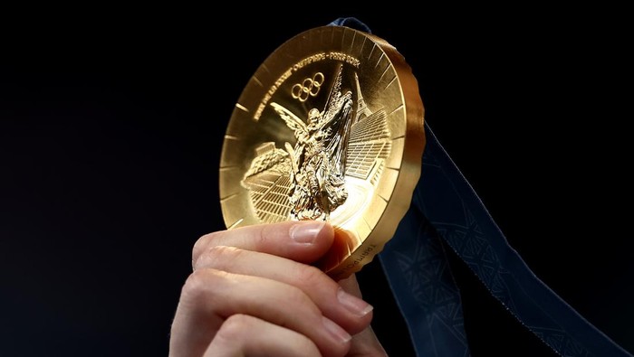 PARIS, FRANCE - AUGUST 02: A detailed view of the gold medal of Bryony Page of Team Great Britain during the medal ceremony for the Trampoline Gymnastics Womens Final on day seven of the Olympic Games Paris 2024 at Bercy Arena on August 02, 2024 in Paris, France. (Photo by Naomi Baker/Getty Images)