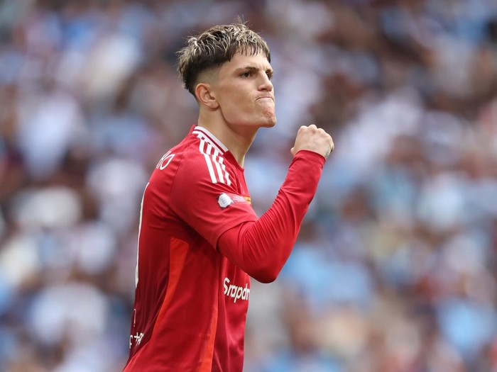 LONDON, ENGLAND - AUGUST 10: Alejandro Garnacho of Manchester United celebrates scoring 3rd penalty during the 2024 FA Community Shield match between Manchester United and Manchester City  at Wembley Stadium on August 10, 2024 in London, England. (Photo by Neal Simpson/Sportsphoto/Allstar via Getty Images)
