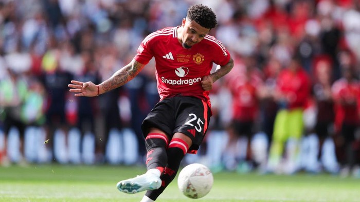 LONDON, ENGLAND - AUGUST 10: Jadon Sancho of Manchester United takes a penalty to see it saved by Ederson Moraes of Manchester City during the penalty shootout during the 2024 FA Community Shield match between Manchester United and Manchester City  at Wembley Stadium on August 10, 2024 in London, England. (Photo by James Gill - Danehouse/Getty Images)