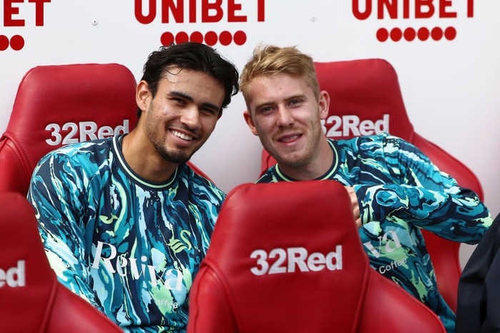 Nathan Tjoe-A-On MIDDLESBROUGH, ENGLAND - AUGUST 10: (L-R) Nathan T-Joe-On and Oliver Cooper of Swansea City sit on the bench prior to the Sky Bet Championship match between Middlesbrough and Swansea City at the Riverside Stadium on August 10, 2024 in Middlesbrough, England. (Photo by Athena Pictures/Getty Images)
