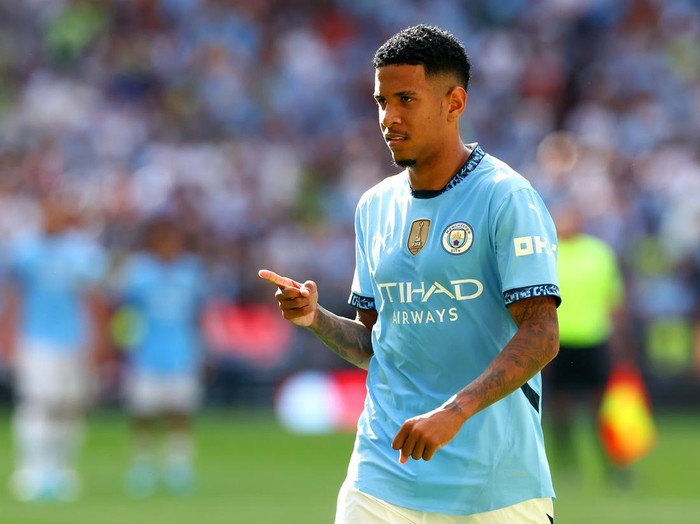 LONDON, ENGLAND - AUGUST 10: Savinho of Manchester City celebrates scoring in the penalty shoot-out following the 2024 FA Community Shield match between Manchester United and Manchester City  at Wembley Stadium on August 10, 2024 in London, England. (Photo by Chris Brunskill/Fantasista/Getty Images)