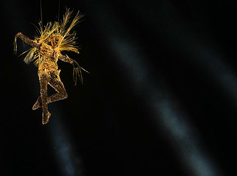 A performer dressed as the Golden voyager performs during the closing ceremony of the Paris 2024 Olympic Games at the Stade de France, in Saint-Denis, in the outskirts of Paris, on August 11, 2024. (Photo by Oli SCARFF / AFP)