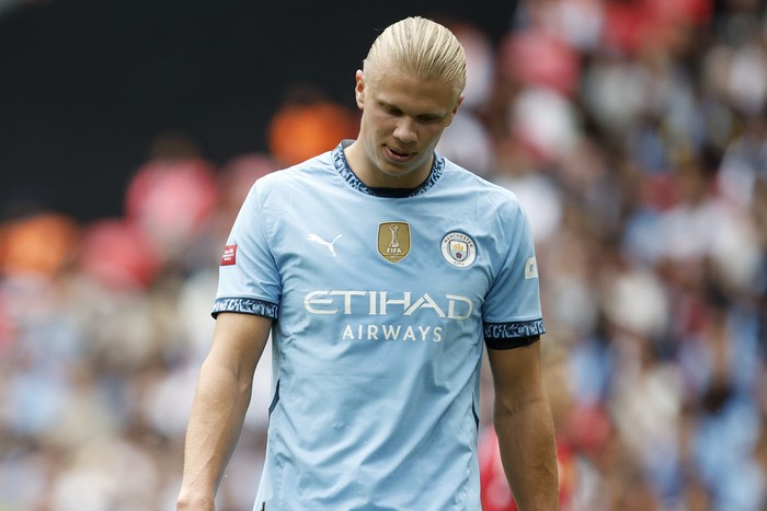 Manchester City forward Erling Haaland reacts after missing a chance to score during the FA Community Shield soccer match between Manchester City and Manchester United at Wembley Stadium in London, Saturday, Aug. 10, 2024. (AP Photo/David Cliff)