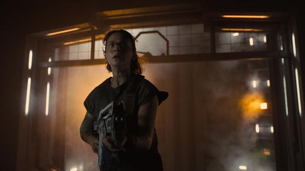 (L-R): Xenomorph and Cailee Spaeny as Rain Carradine in 20th Century Studios' ALIEN: ROMULUS. Photo courtesy of 20th Century Studios. © 2024 20th Century Studios. All Rights Reserved.