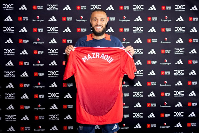  (EXCLUSIVE COVERAGE) Noussair Mazraoui of Manchester United poses after signing for the club at Carrington Training Ground on August 13, 2024 in Manchester, England. (Photo by Manchester United/Manchester United via Getty Images)