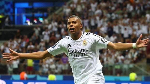   Kylian Mbappe of Real Madrid celebrates scoring a goal to make the score 2-0 during the UEFA Super Cup 2024 match between Real Madrid and Atalanta BC at National Stadium on August 14, 2024 in Warsaw, Poland. (Photo by Chris Brunskill/Fantasista/Getty Images)