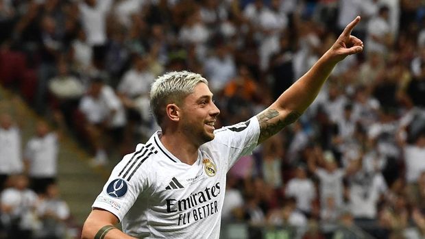 Soccer Football - Super Cup - Real Madrid v Atalanta - National Stadium, Warsaw, Poland - August 14, 2024 Real Madrid's Federico Valverde celebrates scoring their first goal REUTERS/Jennifer Lorenzini