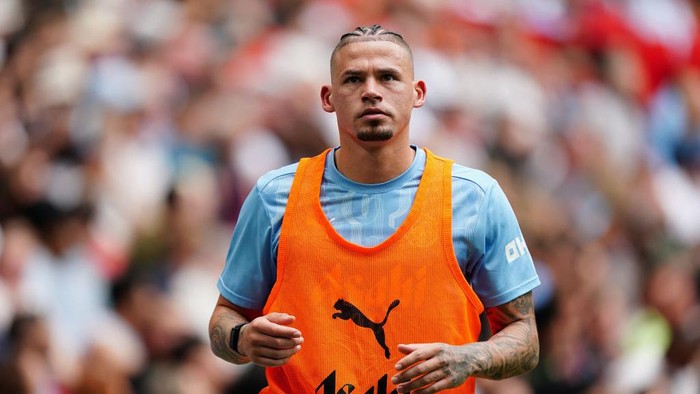 Manchester Citys Kalvin Phillips warms up as a substitute during the FA Community Shield match at Wembley Stadium, London. Picture date: Saturday August 10, 2024. (Photo by Zac Goodwin/PA Images via Getty Images)