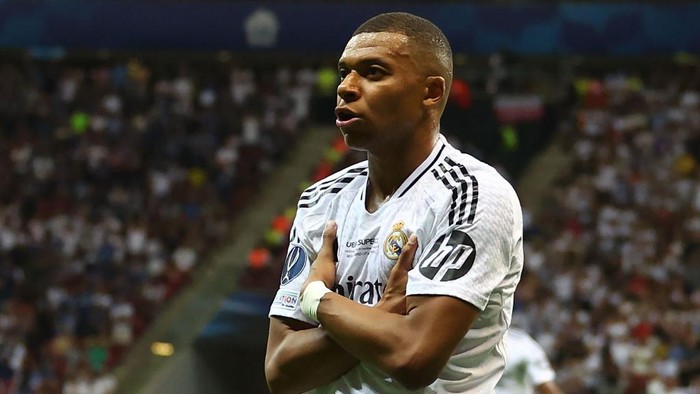WARSAW, POLAND - AUGUST 14:  Kylian Mbappe of Real Madrid celebrates scoring a goal to make the score 2-0  during the UEFA Super Cup 2024 match between Real Madrid and Atalanta BC at National Stadium on August 14, 2024 in Warsaw, Poland. (Photo by Chris Brunskill/Fantasista/Getty Images)