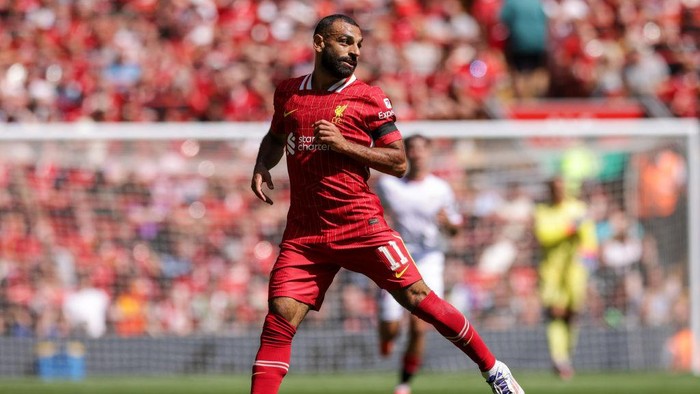 LIVERPOOL, ENGLAND - AUGUST 11: Liverpools Mohamed Salah during the Pre-Season Friendly between Liverpool and Sevilla, at Anfield on August 11, 2024 in Liverpool, England. (Photo by Barrington Coombs/Getty Images)