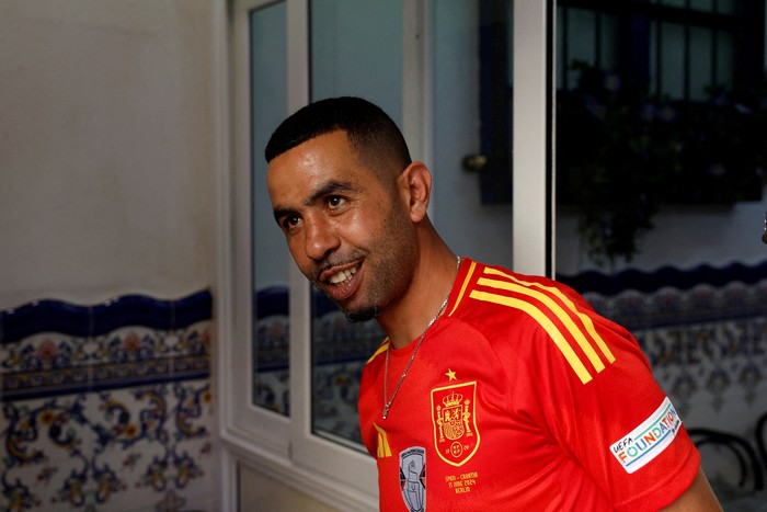FILE PHOTO: Mounir Nasraoui, father of soccer player Lamine Yamal, smiles in Bar El Cordobes at Rocafonda neighbourhood in Mataro, north of Barcelona, Spain, July 11, 2024. REUTERS/ Albert Gea/File Photo