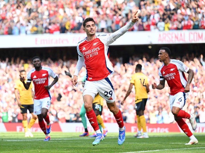 LONDON, ENGLAND - AUGUST 17: Kai Havertz of Arsenal celebrates scoring his team's first goal during the Premier League match between Arsenal FC and Wolverhampton Wanderers FC at Emirates Stadium on August 17, 2024 in London, England. (Photo by Stuart MacFarlane/Arsenal FC via Getty Images)