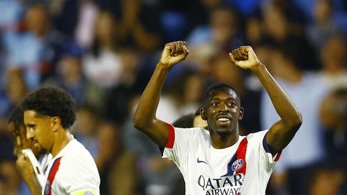 Soccer Football - Ligue 1 - Le Havre v Paris St Germain - Stade Oceane, Le Havre, France - August 16, 2024  Paris St Germains Ousmane Dembele celebrates scoring their second goal REUTERS/Abdul Saboor