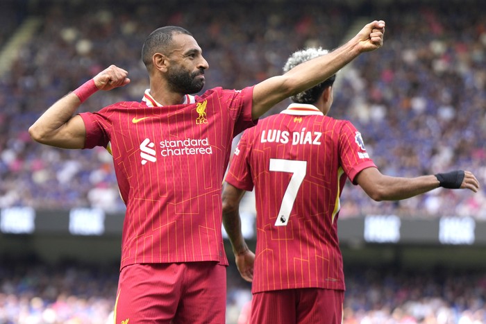 Mohamed Salah Liverpools Mohamed Salah, left, celebrates after he scores his sides second goal during the English Premier League soccer match between Ipswich Town and Liverpool at Portman Road stadium in Ipswich, England, Saturday, Aug. 17, 2024. (AP Photo/Alastair Grant)