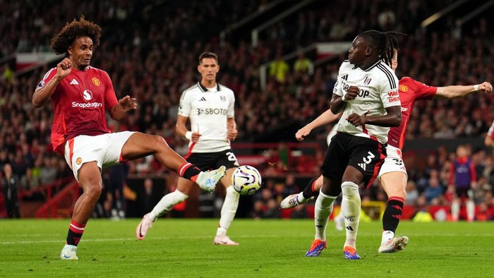 Manchester Uniteds Joshua Zirkzee scores their sides first goal of the game during the Premier League match at Old Trafford, Manchester. Picture date: Friday August 16, 2024. (Photo by Martin Rickett/PA Images via Getty Images)