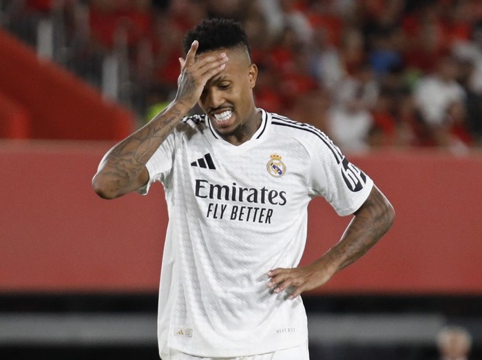 Real Madrid's Eder Militao reacts during a Spanish La Liga soccer match between Mallorca and Real Madrid at the Son Moix Stadium in Palma de Mallorca, Spain, Sunday, Aug. 18, 2024. (AP Photo/Francisco Ubilla)