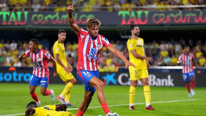 VILLARREAL, SPAIN - AUGUST 19: Marcos Llorente of Athletico de Madrid celebrates scoring his teams first goal during the La Liga match between Villarreal CF and Club Atlético de Madrid at Estadio de la Ceramica on August 19, 2024 in Villarreal, Spain. (Photo by Aitor Alcalde/Getty Images)