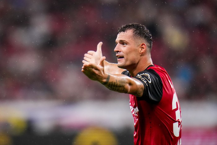 LEVERKUSEN, GERMANY - AUGUST 17: Granit Xhaka of Bayer 04 Leverkusen reacts during the DFL Supercup 2024 match between Bayer 04 Leverkusen and VfB Stuttgart at BayArena on August 17, 2024 in Leverkusen, Germany. (Photo by Rene Nijhuis/MB Media/Getty Images)