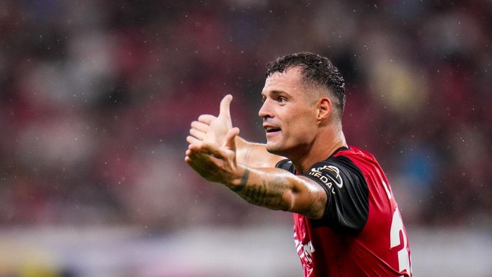 LEVERKUSEN, GERMANY - AUGUST 17: Granit Xhaka of Bayer 04 Leverkusen reacts during the DFL Supercup 2024 match between Bayer 04 Leverkusen and VfB Stuttgart at BayArena on August 17, 2024 in Leverkusen, Germany. (Photo by Rene Nijhuis/MB Media/Getty Images)