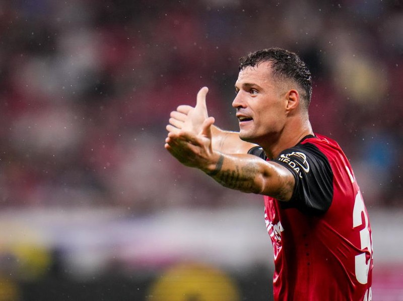 LEVERKUSEN, GERMANY - AUGUST 17: Granit Xhaka of Bayer 04 Leverkusen reacts during the DFL Supercup 2024 match between Bayer 04 Leverkusen and VfB Stuttgart at BayArena on August 17, 2024 in Leverkusen, Germany. (Photo by Rene Nijhuis/MB Media/Getty Images)