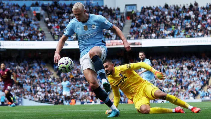 Erling Haaland Soccer Football - Premier League - Manchester City v Ipswich Town - Etihad Stadium, Manchester, Britain - August 24, 2024 Manchester City's Erling Haaland scores their third goal Action Images via Reuters/Craig Brough EDITORIAL USE ONLY. NO USE WITH UNAUTHORIZED AUDIO, VIDEO, DATA, FIXTURE LISTS, CLUB/LEAGUE LOGOS OR 'LIVE' SERVICES. ONLINE IN-MATCH USE LIMITED TO 120 IMAGES, NO VIDEO EMULATION. NO USE IN BETTING, GAMES OR SINGLE CLUB/LEAGUE/PLAYER PUBLICATIONS. PLEASE CONTACT YOUR ACCOUNT REPRESENTATIVE FOR FURTHER DETAILS..