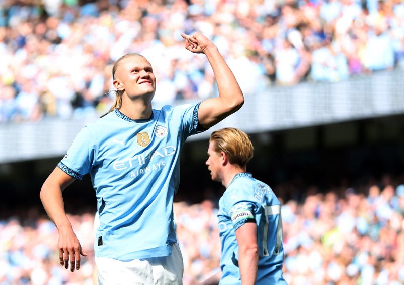 Soccer Football - Premier League - Manchester City v Ipswich Town - Etihad Stadium, Manchester, Britain - August 24, 2024 Manchester City's Erling Haaland celebrates scoring their third goal Action Images via Reuters/Craig Brough EDITORIAL USE ONLY. NO USE WITH UNAUTHORIZED AUDIO, VIDEO, DATA, FIXTURE LISTS, CLUB/LEAGUE LOGOS OR 'LIVE' SERVICES. ONLINE IN-MATCH USE LIMITED TO 120 IMAGES, NO VIDEO EMULATION. NO USE IN BETTING, GAMES OR SINGLE CLUB/LEAGUE/PLAYER PUBLICATIONS. PLEASE CONTACT YOUR ACCOUNT REPRESENTATIVE FOR FURTHER DETAILS..