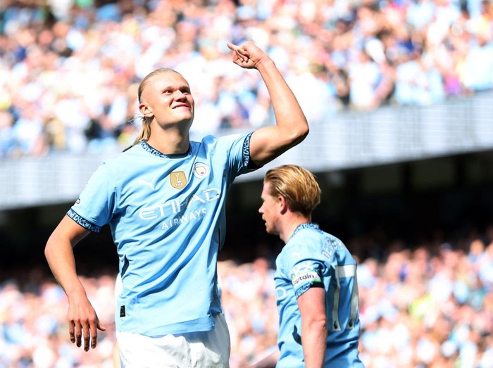 Soccer Football - Premier League - Manchester City v Ipswich Town - Etihad Stadium, Manchester, Britain - August 24, 2024 Manchester City's Erling Haaland celebrates scoring their third goal Action Images via Reuters/Craig Brough EDITORIAL USE ONLY. NO USE WITH UNAUTHORIZED AUDIO, VIDEO, DATA, FIXTURE LISTS, CLUB/LEAGUE LOGOS OR 'LIVE' SERVICES. ONLINE IN-MATCH USE LIMITED TO 120 IMAGES, NO VIDEO EMULATION. NO USE IN BETTING, GAMES OR SINGLE CLUB/LEAGUE/PLAYER PUBLICATIONS. PLEASE CONTACT YOUR ACCOUNT REPRESENTATIVE FOR FURTHER DETAILS..