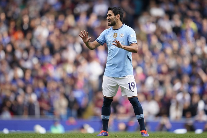 Manchester Citys Ilkay Gundogan gestures during the English Premier League soccer match between Manchester City and Ipswich Town at the Etihad Stadium in Manchester, England, Saturday, Aug. 24, 2024. (AP Photo/Dave Thompson)