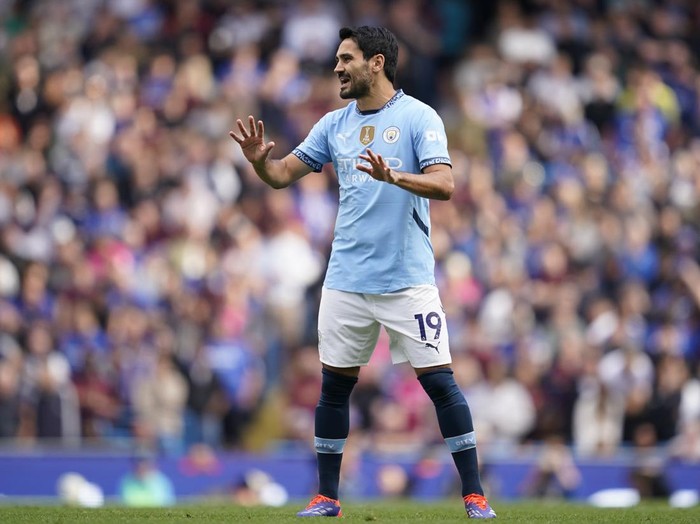 Manchester City's Ilkay Gundogan gestures during the English Premier League soccer match between Manchester City and Ipswich Town at the Etihad Stadium in Manchester, England, Saturday, Aug. 24, 2024. (AP Photo/Dave Thompson)