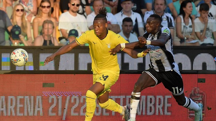 UDINE, ITALY - AUGUST 24: Tijjani Nolsin of SS Lazio compete for the ball with Hassane Kamara of Udinese Calcio during the Serie A match between Udinese and Lazio at Stadio Friuli on August 24, 2024 in Udine, Italy. (Photo by Marco Rosi - SS Lazio/Getty Images)