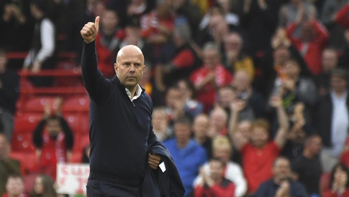 Liverpools manager Arne Slot walks on the pitch at the end of the English Premier League soccer match between Liverpool and Brentford at Anfield Stadium, Liverpool, England, Sunday, Aug. 25, 2024. (AP Photo/Rui Vieira)