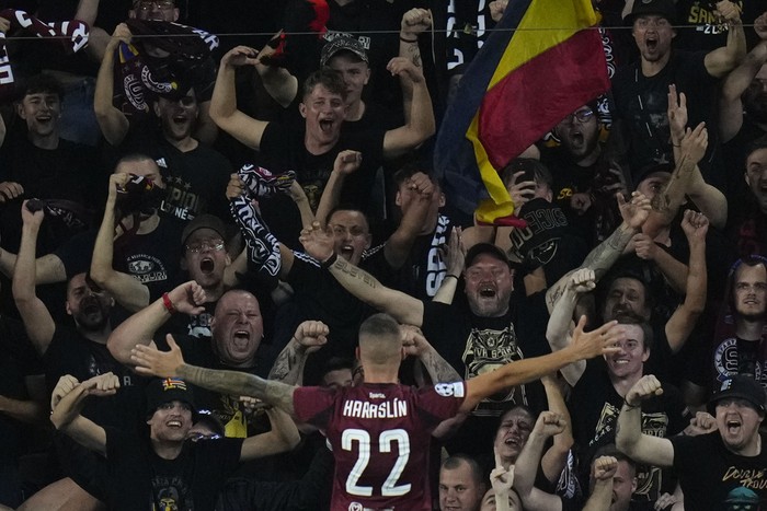 Spartas Lukas Haraslin celebrates after scoring his sides opening goal during the Champions League play-off second leg soccer match between Sparta Praha and Malmo at the Letna stadium in Prague, Czech Republic, Tuesday, Aug. 27, 2024. (AP Photo/Petr David Josek)