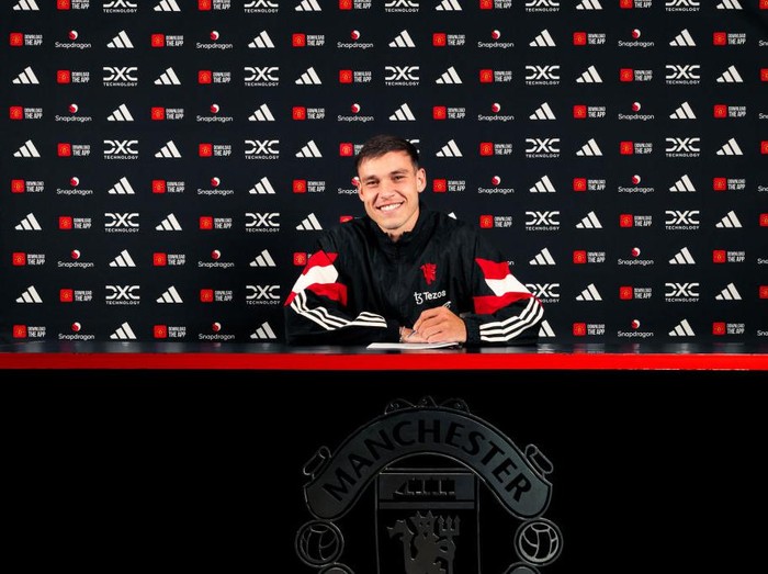 MANCHESTER, ENGLAND - AUGUST 30: (EXCLUSIVE COVERAGE) Manuel Ugarte of Manchester United poses after signing for the club at Carrington Training Ground on August 30, 2024 in Manchester, England. (Photo by Manchester United/Manchester United via Getty Images)