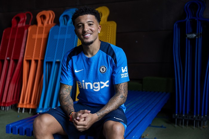 COBHAM, ENGLAND - AUGUST 31: Jadon Sancho poses for pictures as he signs for Chelsea Football Club at Chelsea Training Ground on August 31, 2024 in Cobham, England. (Photo by Chris Lee - Chelsea FC/Chelsea FC)