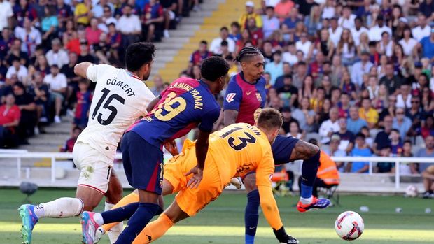 Soccer Football - LaLiga - FC Barcelona v Real Valladolid - Estadi Olimpic Lluis Companys, Barcelona, Spain - August 31, 2024 FC Barcelona's Raphinha scores their fourth goal REUTERS/Bruna Casas