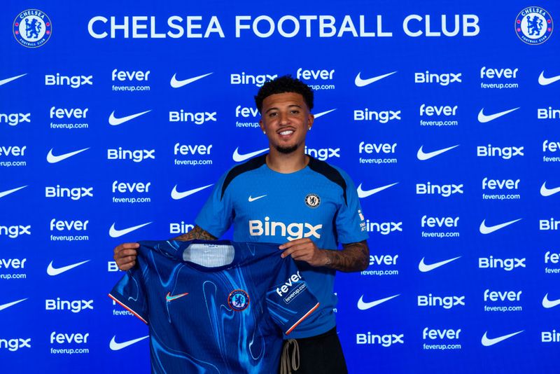  Jadon Sancho poses for pictures as he signs for Chelsea Football Club at Chelsea Training Ground on August 30, 2024 in Cobham, England. (Photo by Chris Lee - Chelsea FC/Chelsea FC)