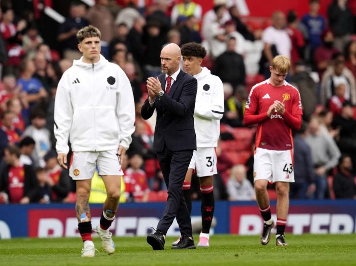 Manchester United manager Erik ten Hag (centre) applauds the fans at the end of the match during the Premier League match at Old Trafford, Manchester. Picture date: Sunday September 1, 2024. (Photo by Nick Potts/PA Images via Getty Images)