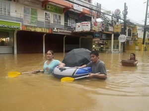 Penampakan Filipina Banjir Usai Diterjang Badai Tropis Yagi Penampakan Filipina Banjir Usai Diterjang Badai Tropis Yagi