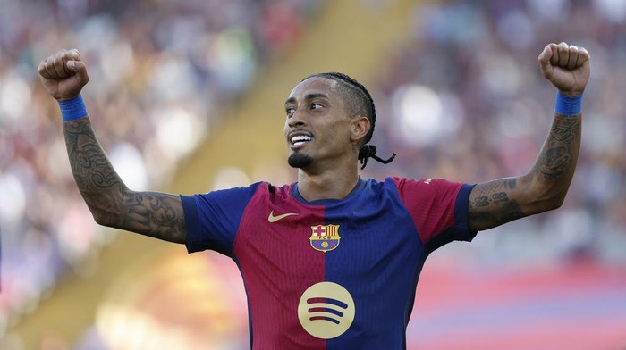 Raphinha Barcelona's Raphinha celebrates scoring his side's 5th goal during the Spanish La Liga soccer match between FC Barcelona and Valladolid at the Olympic stadium in Barcelona, Spain, Saturday, Aug. 31, 2024. (AP Photo/Joan Monfort)