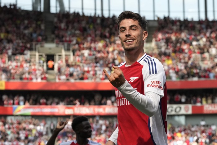 Arsenal's Kai Havertz celebrates after scoring his side's opening goal during the English Premier League soccer match between Arsenal and Wolverhampton Wanderers at Emirates Stadium in London, England, Saturday, Aug. 17, 2024. (AP Photo/Frank Augstein)