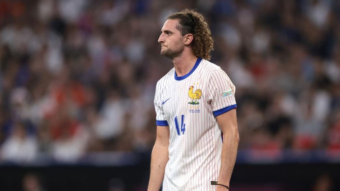 MUNICH, GERMANY - JULY 09: Adrien Rabiot of France looks on during the UEFA EURO 2024 semi-final match between Spain v France at Munich Football Arena on July 09, 2024 in Munich, Germany. (Photo by Jonathan Moscrop/Getty Images)