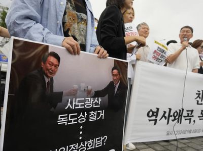 Aksi Protes Menentang PM Jepang Fumio Kishida Berkunjung ke Korsel