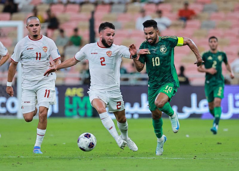 Soccer Football - World Cup - AFC Qualifiers - Group C - Saudi Arabia v Indonesia - King Abdullah Sports City, Jeddah, Saudi Arabia - September 5, 2024 Saudi Arabia's Salem Al Dawsari in action with Indonesia's Calvin Verdonk REUTERS/Stringer