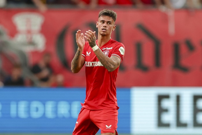 Mees Hilgers of FC Twente Enschede celebrates after scoring his teams first goal during the UEFA Champions League Third Qualification Round - Second Leg match between Twente Enschede and RB Salzburg at Grolsch Veste on August 13, 2024 in Enschede, Netherlands. (Photo by Marco Steinbrenner/DeFodi Images via Getty Images)