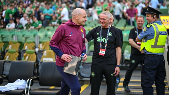 Dublin , Ireland - 7 September 2024; England interim manager Lee Carsley mistakenly sits at the Republic of Ireland bench before the UEFA Nations League B Group 2 match between Republic of Ireland and England at Aviva Stadium in Dublin. (Photo By Stephen McCarthy/Sportsfile via Getty Images)