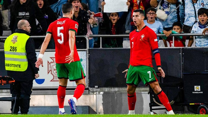 LISBON, PORTUGAL - SEPTEMBER 08: Portugals Cristiano Ronaldo celebrates scoring to make it 2-1 during a UEFA Nations League match between Portugal and Scotland at the Estadio da Luz, on September 08, 2024, in Lisbon, Portugal. (Photo by Craig Williamson/SNS Group via Getty Images)