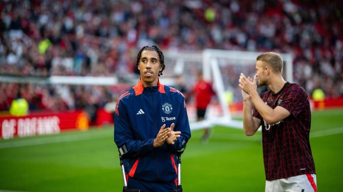 MANCHESTER, ENGLAND - AUGUST 16:  Leny Yoro of Manchester United reacts prior to the Premier League match between Manchester United FC and Fulham FC at Old Trafford on August 16, 2024 in Manchester, United Kingdom. (Photo by Ash Donelon/Manchester United via Getty Images)