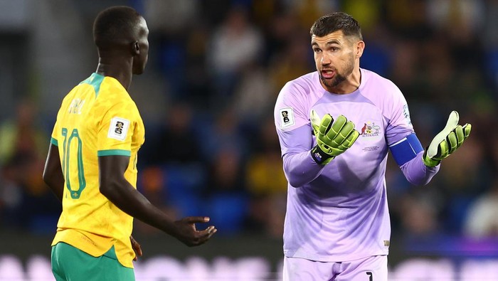 GOLD COAST, AUSTRALIA - SEPTEMBER 05: Mathew Ryan of Australia talks to a10during the round three 2026 FIFA World Cup AFC Asian Qualifier match between Australia Socceroos and Bahrain at Robina Stadium on September 05, 2024 in Gold Coast, Australia. (Photo by Chris Hyde/Getty Images)