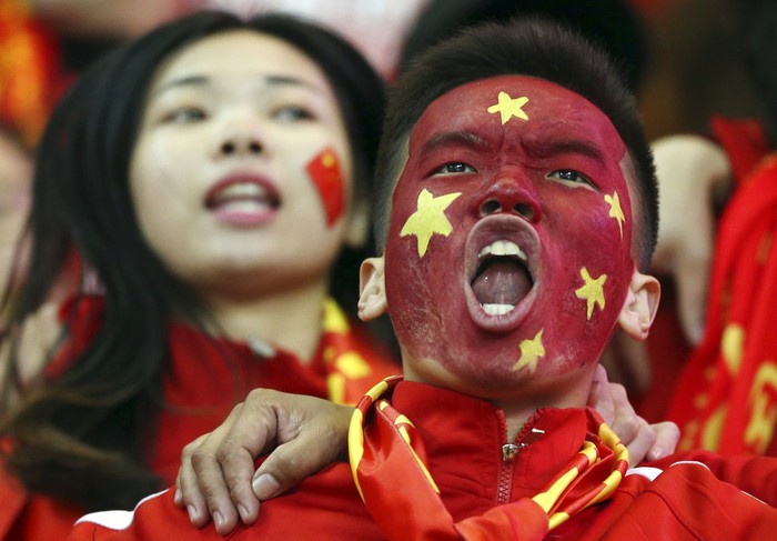 China soccer fans celebrate their teams 1-0 win over South Korea in the 2018 World Cup qualifier in Changsha in central Chinas Hunan Province on Thursday, March 23, 2017. (Color China Photo via AP)